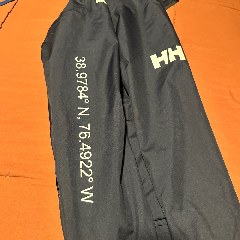 Helly Hansen rain jacket/ windbreaker size medium- unisex